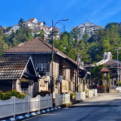 a row of houses on the side of a street at Silverpar B5-5-1 Mountain View(walk up 2 floor up) in Bukit Fraser