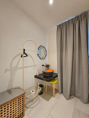 a room with a table and a bowl on a table at Ipoh Young Villa - Hotel Inspired in Ipoh