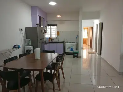 a kitchen and dining room with a table and chairs at Seberang Jaya Family Pool Homestay Near Hospital 3 Bedroom Aircond 2 Bathroom & Family Room Aircond in Perai