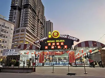 a food court in a city with buildings at 【NEW】Harmony’s Home@Juru Sentral Icon City in Bukit Mertajam