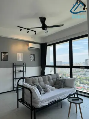 a living room with a couch and large windows at Urban Suites @ George Town Penang by BNB4U in George Town