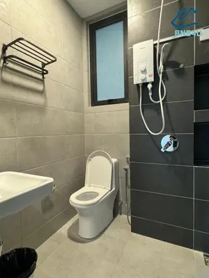 a bathroom with a toilet and a shower at Urban Suites @ George Town Penang by BNB4U in George Town