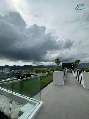 a balcony of a building with a cloudy sky at Urban Suites @ George Town Penang by BNB4U in George Town