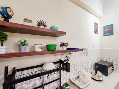 a kitchen with a counter with shelves and plants at Pavilionvillie M1T694 by irainbow in Ipoh