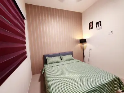 a small bedroom with a bed with a checkered blanket at Pavilionvillie M1T694 by irainbow in Ipoh