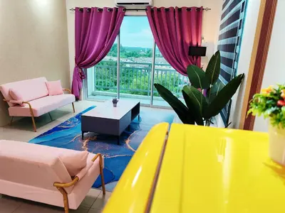 a living room with a yellow table and a large window at Pavilionvillie M1T694 by irainbow in Ipoh