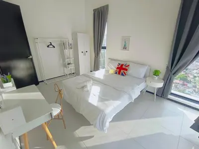 a bedroom with a white bed and a large window at Infinity Pool, Georgetown, Up to 11 Pax, 3 Bedrooms, 2 Bathrooms, 2 Car Parks by Star Home in Jelutong