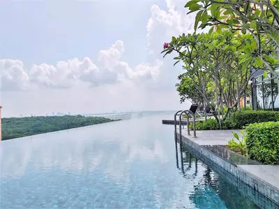 a swimming pool with a view of a river at Infinity Pool, Georgetown, Up to 11 Pax, 3 Bedrooms, 2 Bathrooms, 2 Car Parks by Star Home in Jelutong