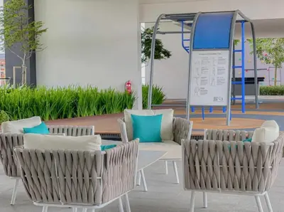 a group of chairs and a couch in a patio at Infinity Pool, Georgetown, Up to 11 Pax, 3 Bedrooms, 2 Bathrooms, 2 Car Parks by Star Home in Jelutong