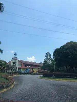 an empty street with a building in the background at DHW Homestay in Simpang Ampat Semanggol
