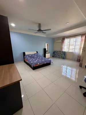 a bedroom with a bed on a tiled floor at DOUBLE EE HOMESTAY 6 cars parking place 12pax in Sitiawan