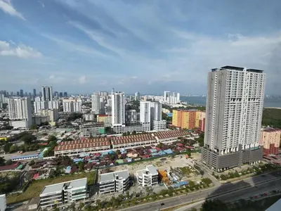 an aerial view of a city with tall buildings at Urban Simplicity Suite, 5 Pax, 2 Car Parks at Urban Suites Georgetown by SuperStay in Jelutong