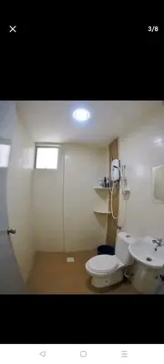 a bathroom with a toilet and a sink at 288 Sekinchan Coze Home in Sekincan