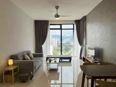 a living room with a couch and a large window at Rooftop - Sky Pool - 2BR Premium Homestay - Georgetown \u57ce\u5e02 6 pax in George Town