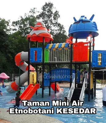 a water park with a water slide in the water at Putra 2 Homestay in Gua Musang