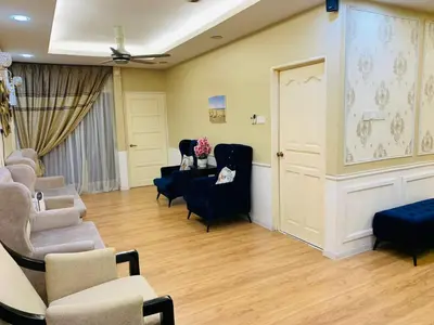 a salon with chairs and a waiting room at zam homestay kulim perdana hitech utk Msliim shj in Kulim