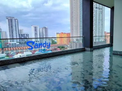 a pool of water with a view of a city at View of the whole Georgetown in George Town