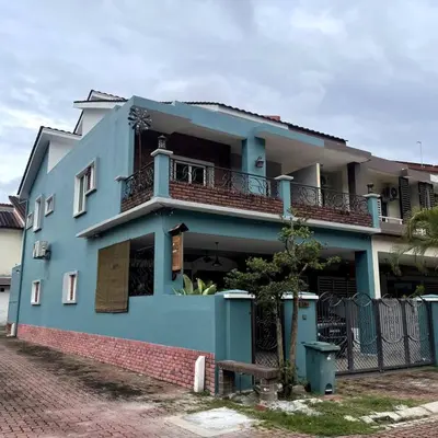 a blue house with a balcony on a street at YouLuvHomestay 4BR for 16-18 Pax Gunung Rapat Ipoh in Ipoh