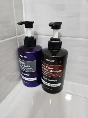 two bottles of mouth wash sitting on a bathroom counter at Seberang Jaya Family Pool Homestay Near Hospital 3 Bedroom Aircond 2 Bathroom & Family Room Aircond in Permatang Janggus