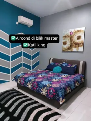 a bedroom with a bed in a room at Puteri Homestay Sg Petani in Sungai Petani