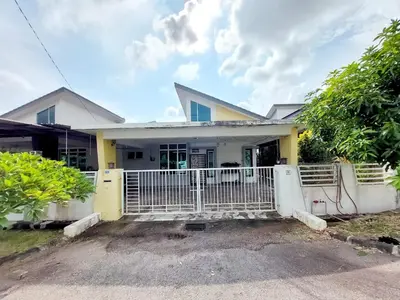 a house with a gate in front of it at Puteri Homestay Sg Petani in Sungai Petani
