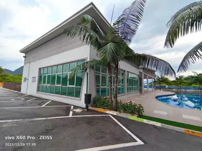 a building with a palm tree in front of it at Pavilionvillie M1T696 by irainbow in Ipoh