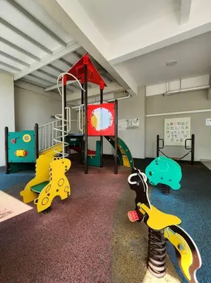 a play room with several different types of playground equipment at Modern Suite in Penang Island in Jelutong