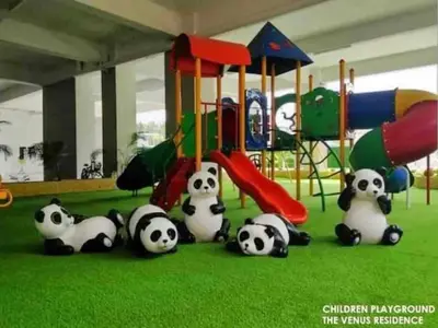a group of pandas sitting in front of a playground at The Ximplicity @ Venus Residence Sitiawan Manjung in Sitiawan