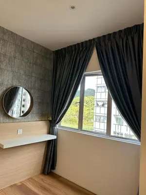 a room with a window with black curtains and a mirror at Adik Aisyah Muji Homestay Cameron Highlands N in Cameron Highlands