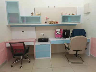 a office with two chairs and a desk with a printer at perdana homestay in Ipoh
