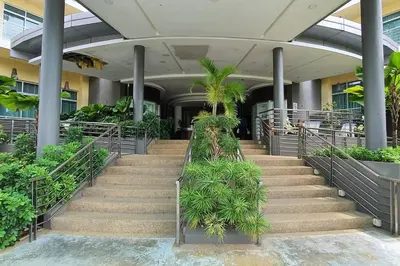a group of stairs in a building with plants at Sky Residence -3 Bedrooms Condo at Cinta Sayang, Sungai Petani in Sungai Petani