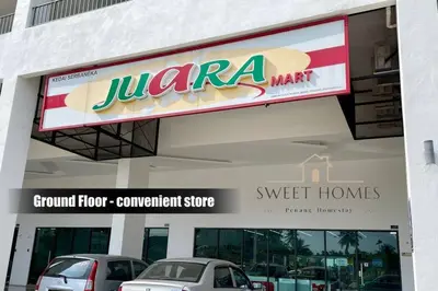 a sign for a grocery store with cars parked outside at CozySuite3R2B#5mintoPenangBridge in Perai