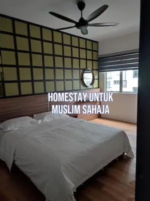 a bedroom with a bed with a ceiling fan at Adik aisyah muji pistachio homestay cameron highlands in Tanah Rata