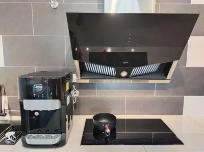 a coffee maker sitting on top of a counter at Dawn de Ville-Private Pool BBQ Karaoke 34-40pax in Ipoh