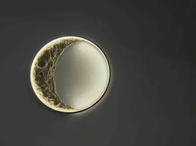 a silver ring with a mirror on a black background at Dawn de Ville-Private Pool BBQ Karaoke 34-40pax in Ipoh