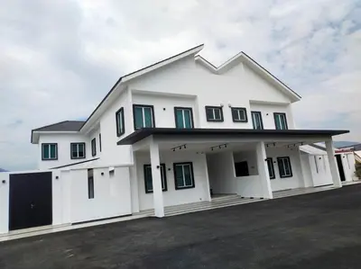 a large white house with a garage at Dawn de Ville-Private Pool BBQ Karaoke 34-40pax in Ipoh