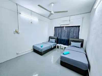 a hospital room with two beds and a window at PANCHOR 6 HOSTEL in George Town