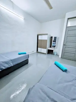a room with a bed and a door and a floor at PANCHOR 6 HOSTEL in George Town