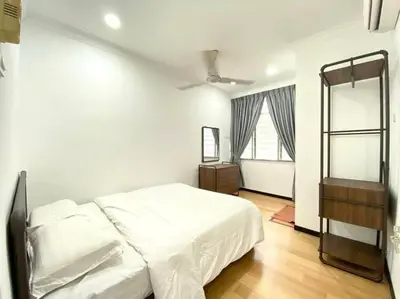 a bedroom with a white bed and a mirror at Garden view bangalow wedding 12pax in Butterworth