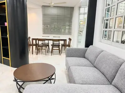 a living room with a couch and a table at Garden view bangalow wedding 12pax in Butterworth