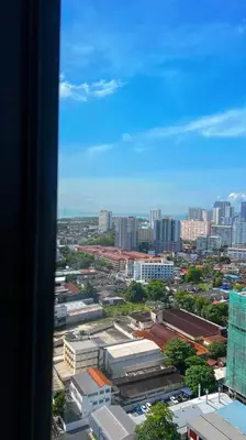 a view from a window of a city with buildings at Beacon Suites #Georgetown #RoofTopPool #23 #2Bedrooms in George Town
