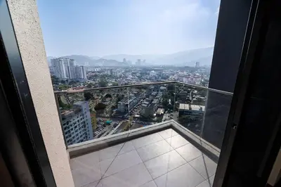 a view of a city from the balcony of a building at Beacon Suites #Georgetown #RoofTopPool #23 #2Bedrooms in George Town