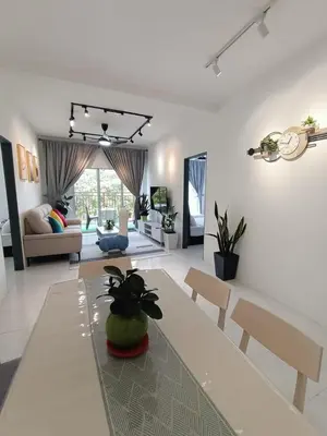 a white living room with a table and chairs at Dream 5 @ Emerald avenue in Brinchang