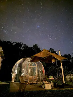 a starry night with an igloo and an umbrella at The Starry Dome Family Room 2A 2K in Cameron Highlands