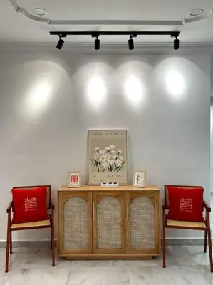 a room with two chairs and a table with a picture at Cozy 2StoreyHome 5Room11Pax@ChaiLengPark in Perai