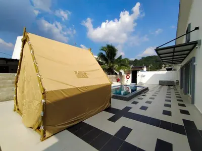 a large yellow tent sitting on top of a building at Evening/Night de Ville-50pax Private Pool BBQ in Ipoh