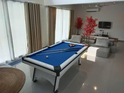 a living room with a pool table in it at Evening/Night de Ville-50pax Private Pool BBQ in Ipoh