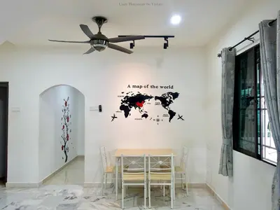 a map of the world wall sticker in a dining room at Ipoh Cozy Homestay for 10-13pax in Ipoh