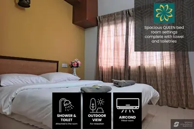 a room with a bed with two boxes on it at Thara Beach Resort in Pasir Bogak