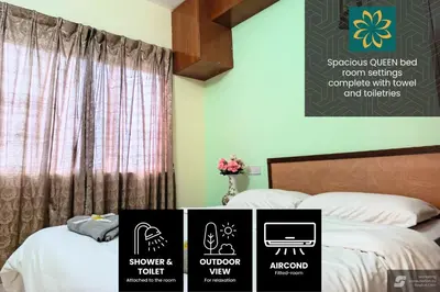 two beds in a room with signs on the wall at Thara Beach Resort in Pasir Bogak